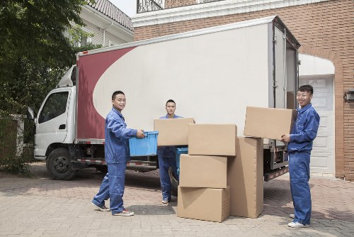 Packed moving boxes and furniture prepared for transport