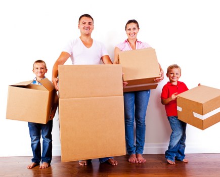 Student removals team loading boxes outside a Lambeth flat