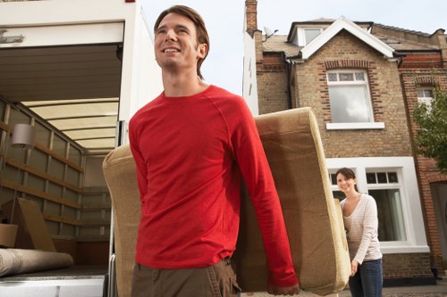 House move support with furniture and boxes loaded into a truck