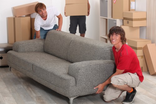 Packed boxes and furniture ready for flat removals